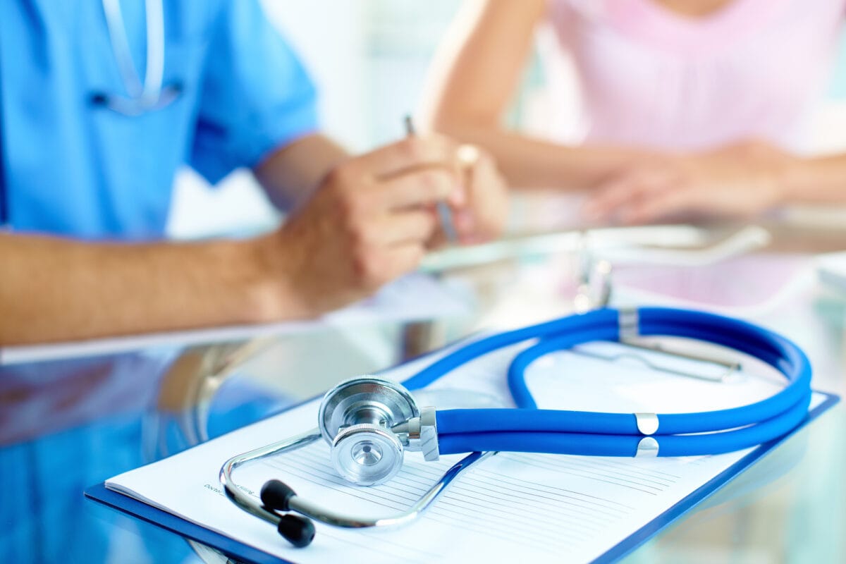 closeup of stethoscope on clipboard