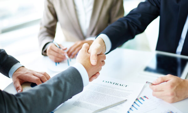 two people shaking hands